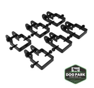 Six black metal Fence Bracket Panel To Post - Corner, End, T Fastener brackets with bolts are arranged in two rows on a white background. The green and black "Dog Park Fencing.com" logo is visible in the bottom right corner.