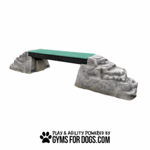 Ellie's Boulder Bridge Pro features a green walking surface with faux rock supports and bumper pads. Includes set of 2 rocks. Text below: "Play & Agility Powered by GymsForDogs.com" with a paw print icon.