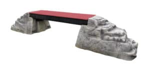 Ellie's Boulder Bridge Pro features a red walkway supported by two large gray faux-rocks and bumper pads, ideal for canine training or play in dog parks.