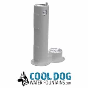A gray outdoor water fountain with a drinking spout at the top and a lower dog water bowl. The logo below reads "COOL DOG WATER FOUNTAINS.COM" with a dog illustration beside the text.