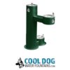 Green outdoor drinking fountain with three spouts at different heights for adults, children, and pets. Below is the "Cool Dog Water Fountains" logo with a dog illustration and website text.