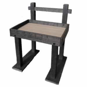 A sturdy black dog training platform with raised edges, a flat wooden center, and a backrest labeled "DOG POST." The platform stands on two wide legs for stability.