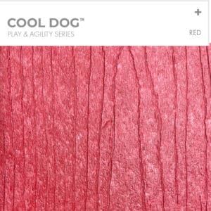 Text reads "COOL DOG PLAY & AGILITY SERIES RED" above a textured red surface with vertical lines resembling wood grain or bark.