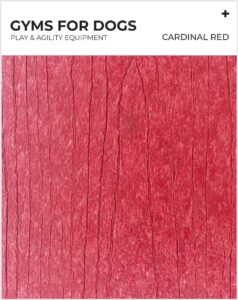 A sample of textured cardinal red material with wood grain patterns, labeled "GYMS FOR DOGS: PLAY & AGILITY EQUIPMENT" and "CARDINAL RED" at the top.